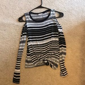 A black and white long sleeve shirt.